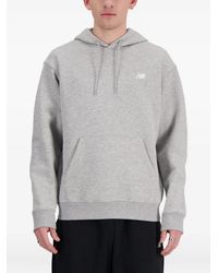 New Balance - Drawstring Logo-Detail Hoodie - Lyst