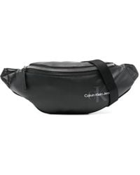 Calvin Klein - Logo-Print Faux-Leather Belt Bag - Lyst