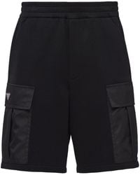Prada - Pantalones cortos con logo triangular - Lyst