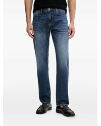 ARMANI EXCHANGE - Logo-Embroidered Faded Jeans - Lyst