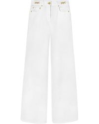 Versace - Mid-rise Flared Jeans - Lyst