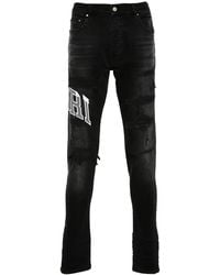 Amiri - Varsity Logo Repair Jeans - Lyst