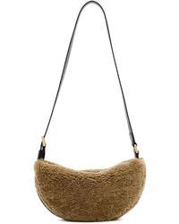 AllSaints - Umhängetasche aus Shearling - Lyst