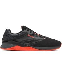 Reebok - Nano X4 "black/orange" スニーカー - Lyst