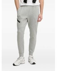 Under Armour - Unstoppable Logo-Print Track Pants - Lyst