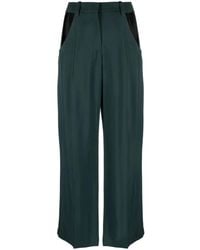 Mugler - Pantalones anchos con aberturas - Lyst