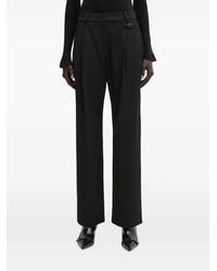 WRSTBHVR - Dorea Logo-Plaque Pleated Trousers - Lyst