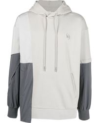 Feng Chen Wang - Logo-embroidered Panelled Hoodie - Lyst