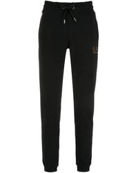 EA7 - Pantalones de chándal con logo con apliques - Lyst