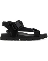 Prada - Logo-Embossed Fabric Suede Sandals - Lyst