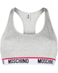Moschino - Brassière de sport à bande logo - Lyst