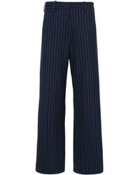 Maje - Pinstriped Mid-rise Flared Trousers - Lyst