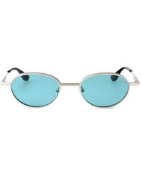 McQueen - Gafas de sol AM0523S con montura oval - Lyst