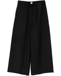 TOTEME - Wool Drawstring Trousers - Lyst