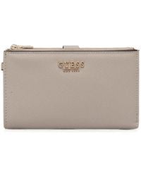 Guess - Logo-Plaque Wristlet Wallet - Lyst