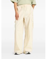 New Balance - Pantalon Palazzo À Poches Cargo - Lyst