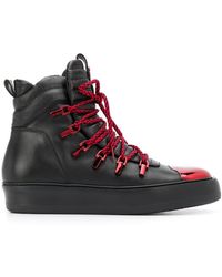 Cesare Paciotti Baskets en cuir à détails contrastants - Noir