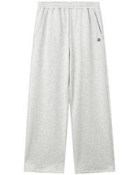 Izzue - Logo-Embroidered Track Pants - Lyst