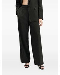 AllSaints - Pantaloni Averie Gessati Con Pieghe - Lyst
