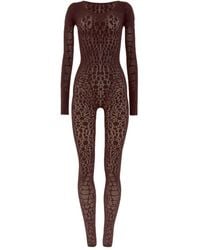 Wolford - パイソンパターン ジャンプスーツ - Lyst