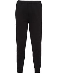 Prada - Pantalon de jogging fuselé à patch logo - Lyst