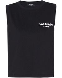 Balmain - Cropped-Top mit geflocktem Logo - Lyst