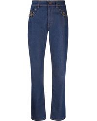 Versace - Buckle-embellished Straight Jeans - Lyst