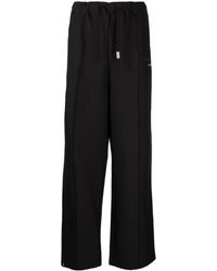 Izzue - Logo-Plaque Straight-Leg Trousers - Lyst