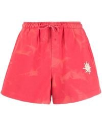 Holzweiler - Tie-Dye Cotton Shorts - Lyst