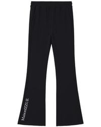 Izzue - Logo-Print Flared Trousers - Lyst