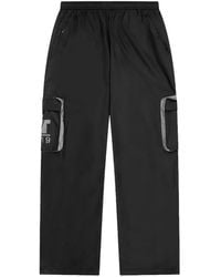 DENIM TEARS - Logo-Print Cargo Pants - Lyst