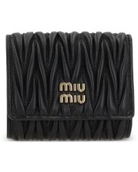 Miu Miu - Portefeuille Matelassé À Logo - Lyst