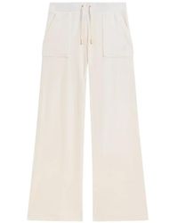 Juicy Couture - Flare-Leg Velour Track Pants - Lyst
