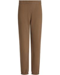 Dolce & Gabbana - Pantalones de chándal con logo en relieve - Lyst