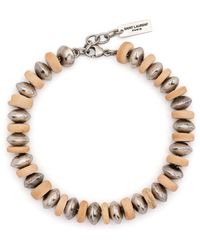 Saint Laurent - Bracelet de perles à breloque logo - Lyst