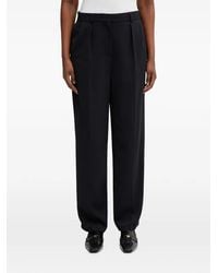 Lacoste - Pleated Logo-Patch Trousers - Lyst
