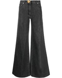 Moschino - Flared-Design Jeans - Lyst