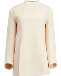 KHAITE - The Mahni Slit-Detail Blouse - Lyst