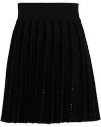 Balmain - Pleated Glitter Knit Skirt - Lyst