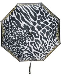 Damen Accessoires Regenschirme Moschino Regenschirm mit Animal-Print in Schwarz Sparen Sie 14% 