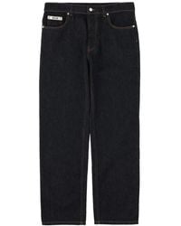 Moschino - Logo-Patch Jeans - Lyst
