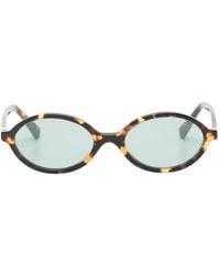 Miu Miu - Tortoiseshell-Pattern Oval-Frame Sunglasses - Lyst