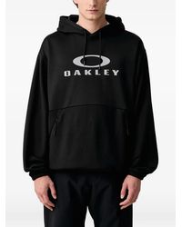 Oakley - Logo-Print Drawstring Hoodie - Lyst