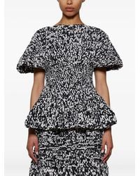 KHAITE - Mathilde Bubble-Sleeve Peplum Top - Lyst