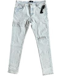 Amiri - Crystal-Applique Logo Jeans - Lyst