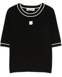 DKNY - Camiseta con ribete de rayas y aplique del logo - Lyst
