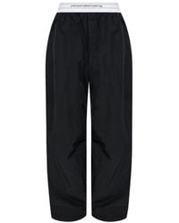 Alexander Wang - Mid-Rise Pleated Wide-Leg Pants With Logo Elastic Waist - Lyst