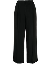 Pantalon court à taille haute Synthétique Moschino en coloris Noir élégants et chinos Pantalons capri et pantacourts Femme Vêtements Pantalons décontractés 