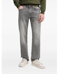 Guess - Logo-Patch Jeans - Lyst