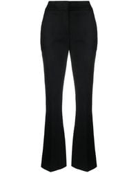 Genny - Laminated Flared Trousers - Lyst